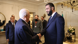 الشرع وعباس.jpg