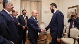 الشرع والعليمي.jpg